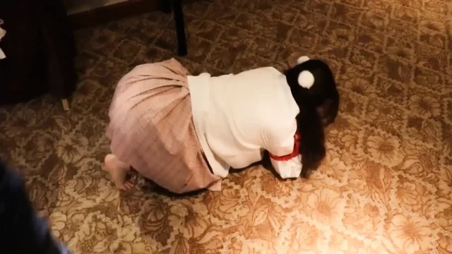A Cute Little Dressed In A Jk Uniform Was Walking Around Barefoot On The Ground.