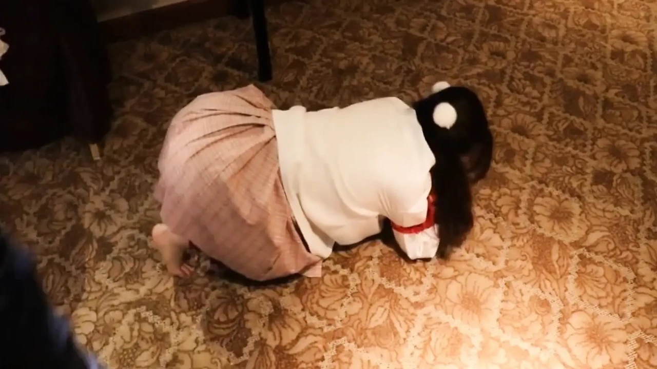A Cute Little Dressed In A Jk Uniform Was Walking Around Barefoot On The Ground.